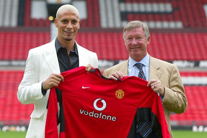 Rio Ferdinand posing with Sir Alex Ferguson during his unveiling at the Theatre of Dreams. Image courtesy talkSPORT