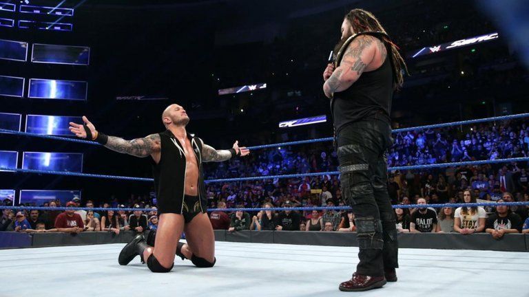 Randy Orton on his knees to Bray Wyatt