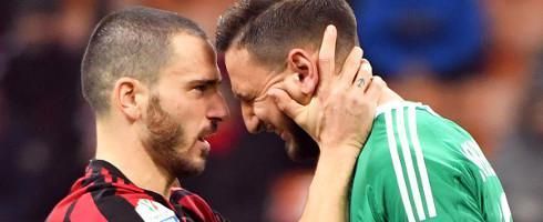 A weeping Donnarumma Gianluigi being consoled by Milan captain Leonardo Bonucci. Image courtesy sports.naija.ngn