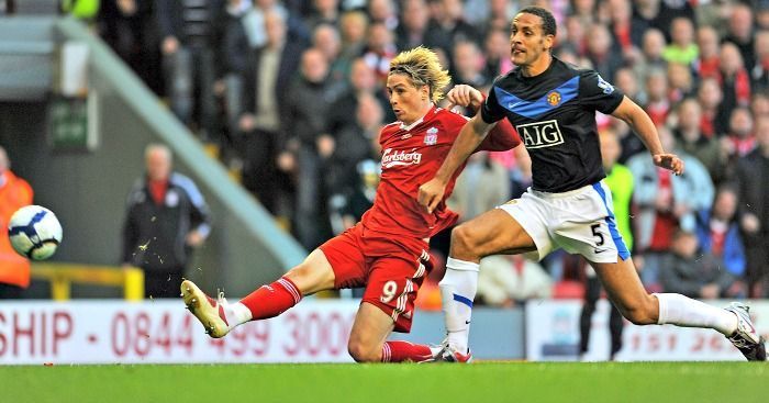 Fernando Torres getting a shot away despite pressure from Rio Ferdinand. Image courtesy Football365