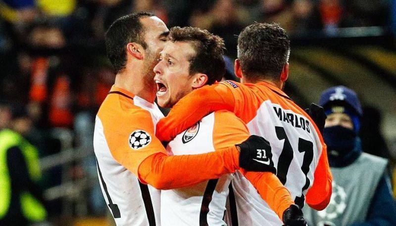 Shakhtar&#039;s attacks celebrate after scoring a goal.