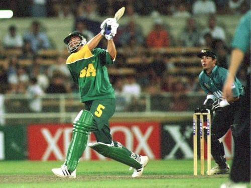 Sth Africa's Hansie Cronje hits a six during the O