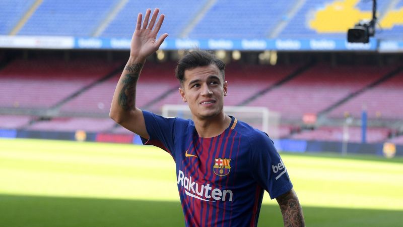 Phillipe Coutinho waves at his fans at the Camp Nou