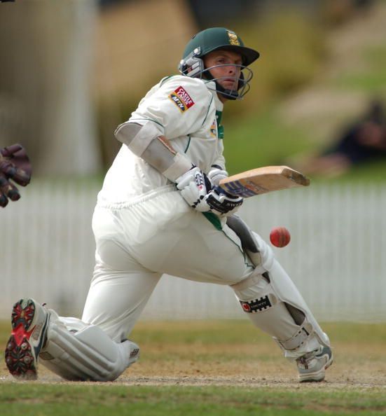 South Africa&#039;s Gary Kirsten sweeps the ball on day