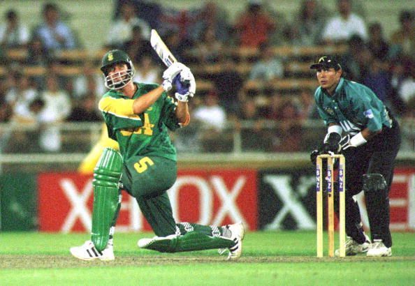 Sth Africa&#039;s Hansie Cronje sweeps the ball during