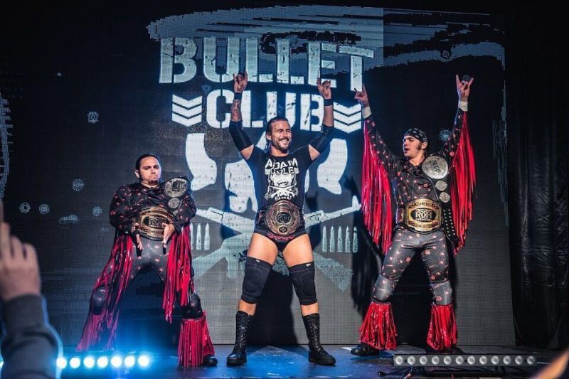 Adam Cole as the ROH World Champion, during his time with the Bullet Club