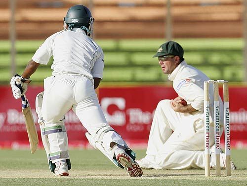 Ricky Ponting completes a catch at silly point.