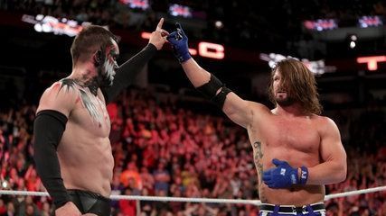 Finn Balor and AJ Styles share a Too Sweet at TLC 2017