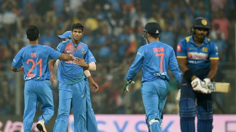 Washington Sundar celebrates after taking his maiden T20I wicket