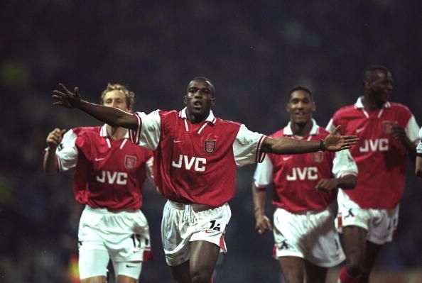 31 Mar 1998:  Arsenal striker Christopher Wreh celebrates scoring the winning goal