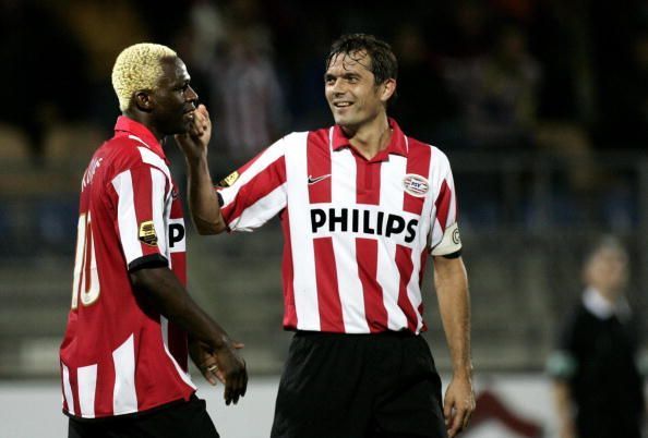 Cocu (R) in action for PSV