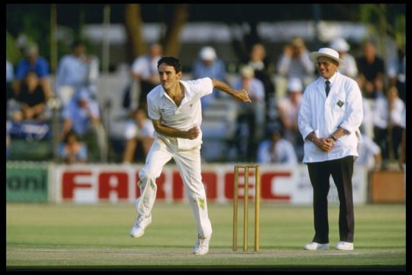 John Traicos of Zimbabwe bowling