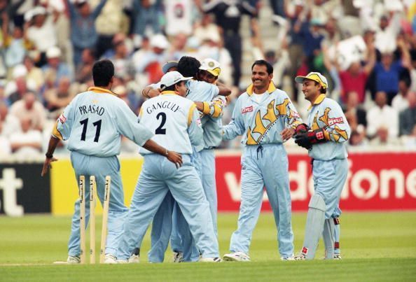 The Indian Team celebrate the wicket