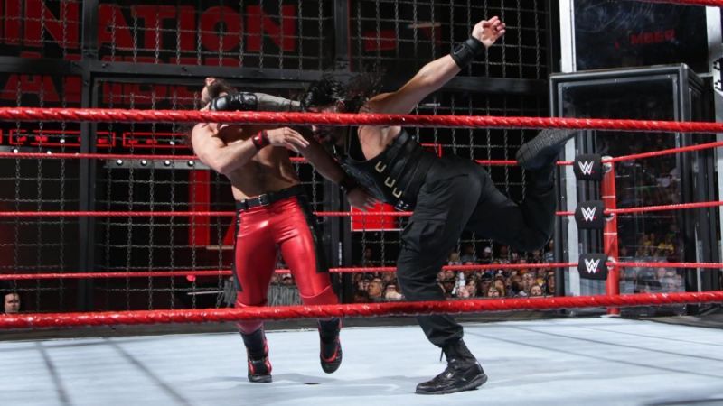 ... but Rollins quickly tries to get the jump on Reigns!