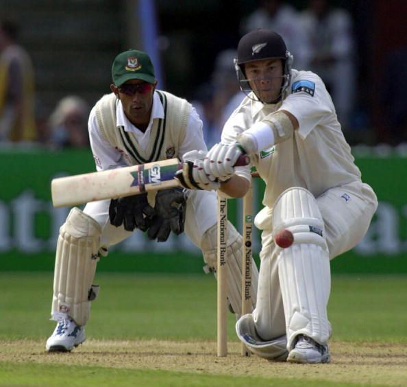 Craig McMillan keeps an eye on the ball as Banglad