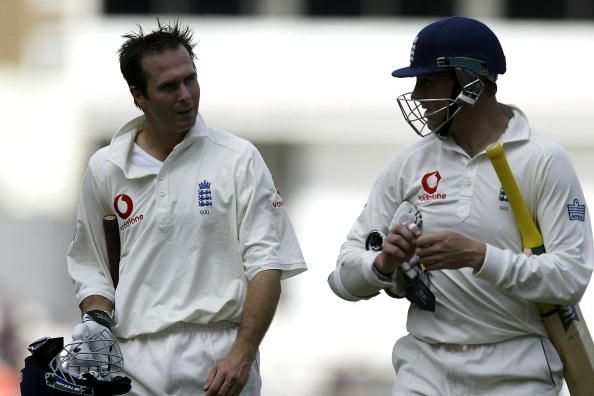 Michael Vaughan and Marcus Trescothick walk off for the lunch break