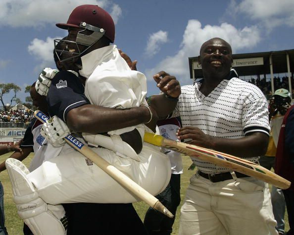 Vasbert Drakes of the West Indies celebrates the win