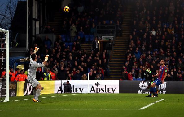 Defoe volleys the ball over Speroni