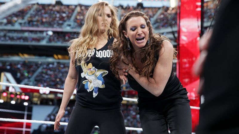 Image result for wwe rousey beats stephanie