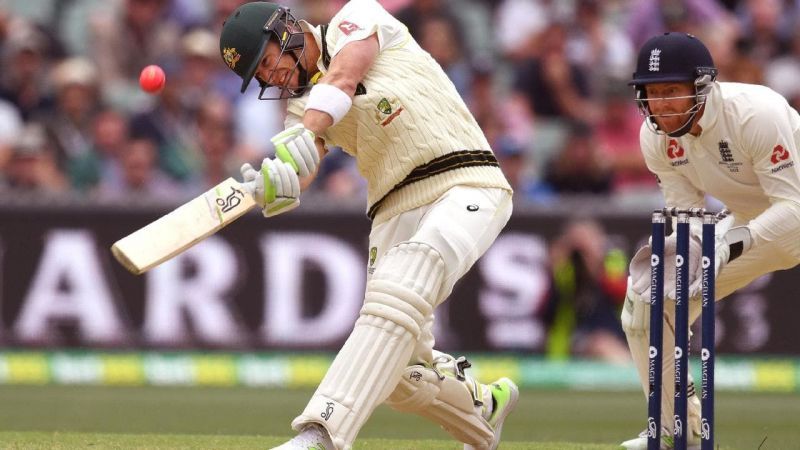 <p>Tim Paine lifts a ball away for six as Jonny Bairstow looks on</p><p>E