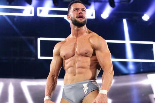 Finn Balor looks on