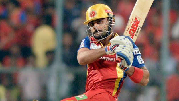 Image result for Virat Kohli stands tall and plays a pull shot for rcb