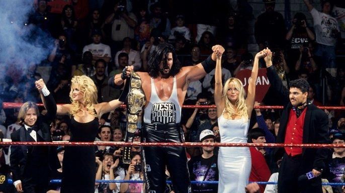 Diesel is just barely the focal point of his own WWF Championship victory celebration.