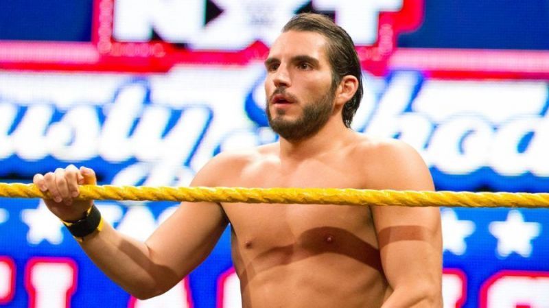 Johnny Gargano looks on