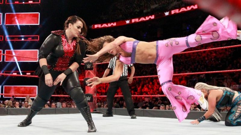 Image result for wwe nia jax throws mickie