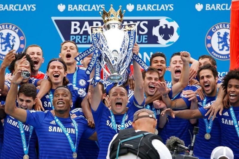 John Terry holding the 2014/15 Premier League title