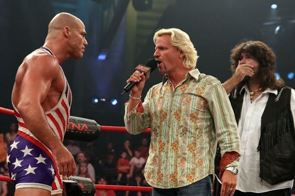 After Karen and Kurt Angle's marriage dissolved, Karen and Jeff Jarrett became a couple. Images courtesy of whatculture.com