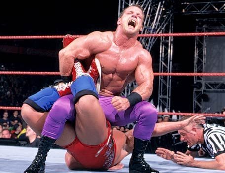 Chris Benoit remembers his Canadian roots to try and force a tapout.
