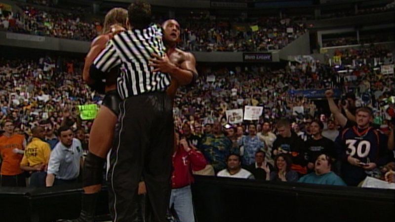If The Rock Rock Bottoming Triple H and Shane McMahon simultaneously through a table happened a month prior, it would have been a classic WrestleMania Moment.