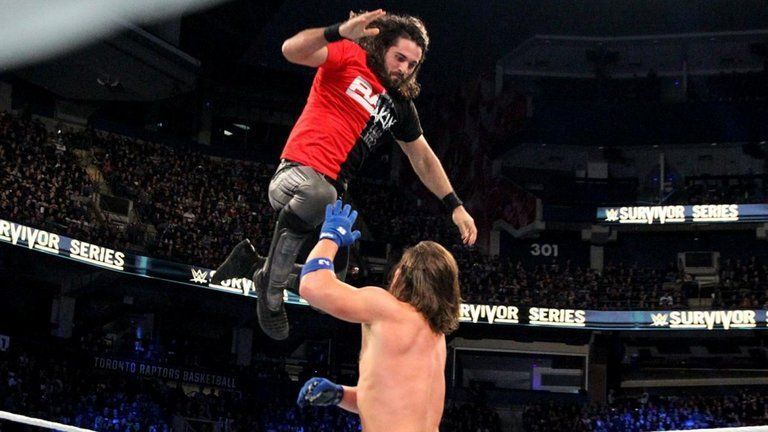 Seth Rollins leaps on to AJ Styles at Survivor Series 2016 
