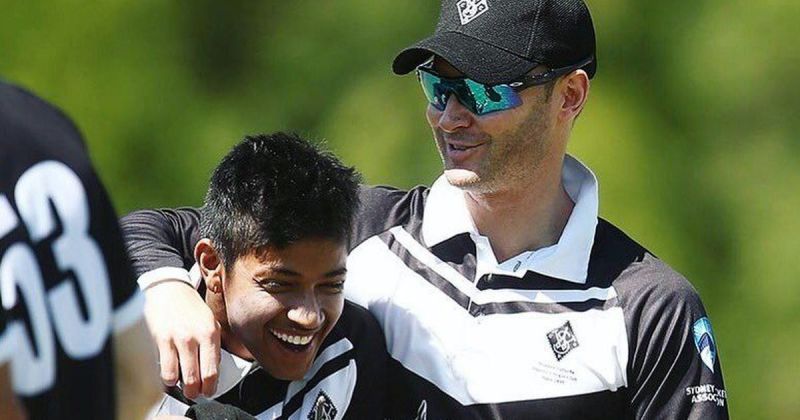 Sandeep with his mentor Michael Clarke