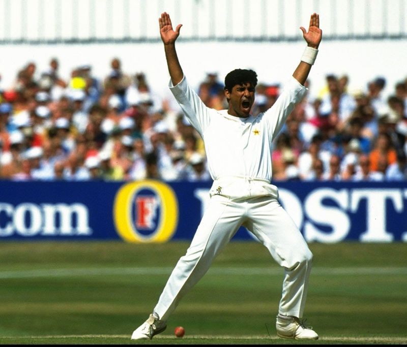Waqar celebrating his 1st Test wicket.