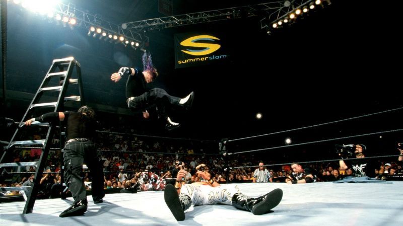 Jeff Hardy drops the leg on Edge from a towering height.