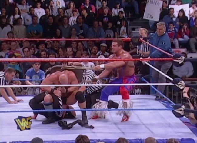 The British Bulldog defends his fellow Hart Foundation member and brother-in-law from Steve Austin.