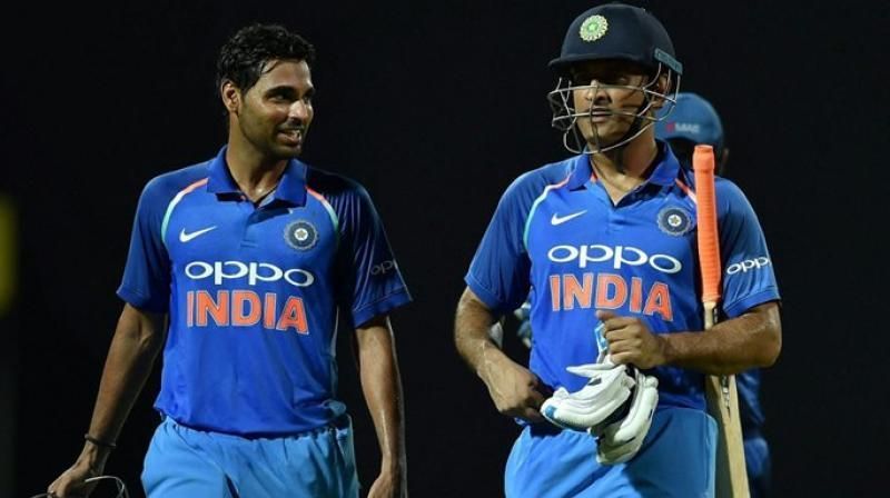 Image result for bhuvneshwar kumar vs ms dhoni