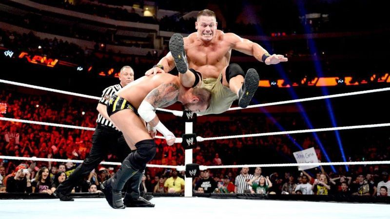 John Cena doing the top rope leg drop on CM Punk.
