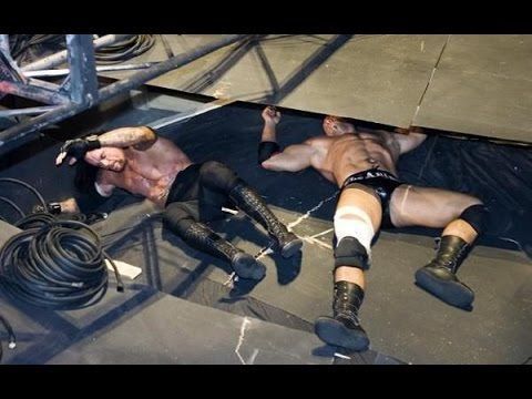 Batista puts his opponent down for the count, but puts himself down, too.