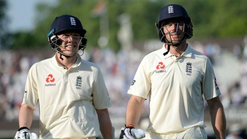 Dom Bess and Jos Buttler walk off for England