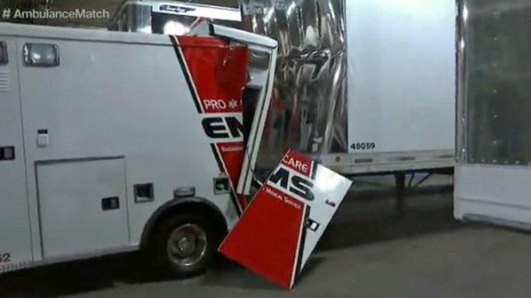 A broken ambulance with Braun Strowman inside it