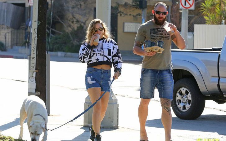 Ronda Rousey is married to UFC Heavyweight Travis Browne (Right)