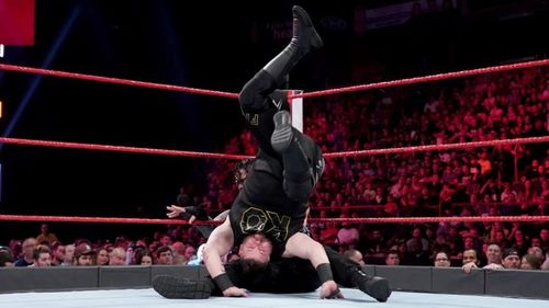 Kevin Owens hit Roman Reigns with a Rolling Senton during their match