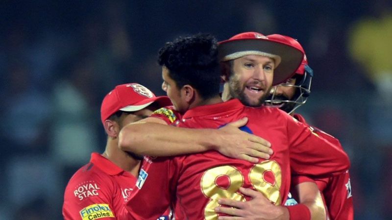 Tye celebrating with his team-mates after picking up a wicket