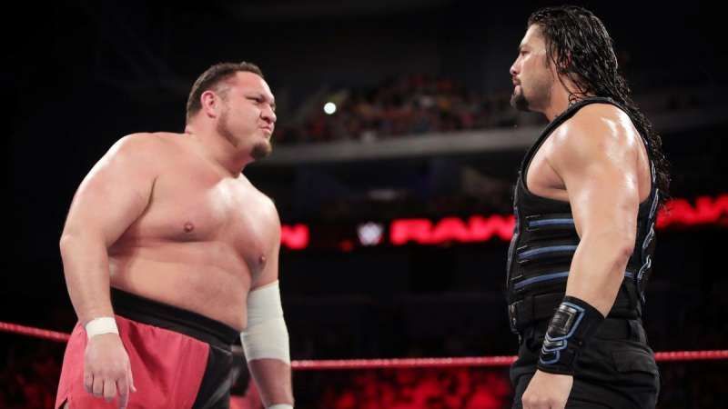 The background between Samoa Joe and Roman Reigns is pretty absurd 
