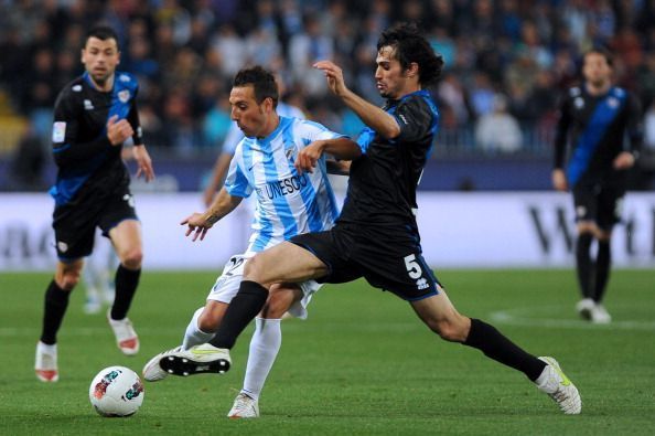 Malaga&#039;s midfielder Santiago Cazorla L)