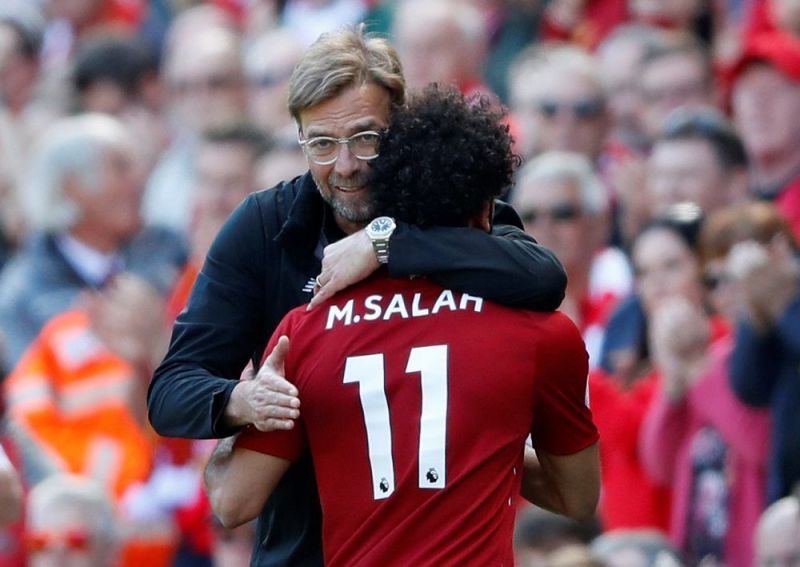 Enter captiJurgen Klopp was all smiles as Liverpool secured a Champions League spot on the final day of the seasonon