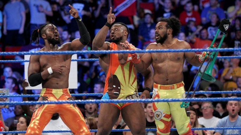 The New Day celebrated after defeating the team of The Bar and The Miz
